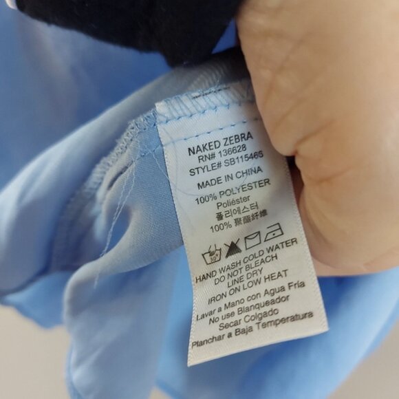 Naked Zebra baby blue blouse with front tie detail and ruffle on the neckline - Picture 5 of 6